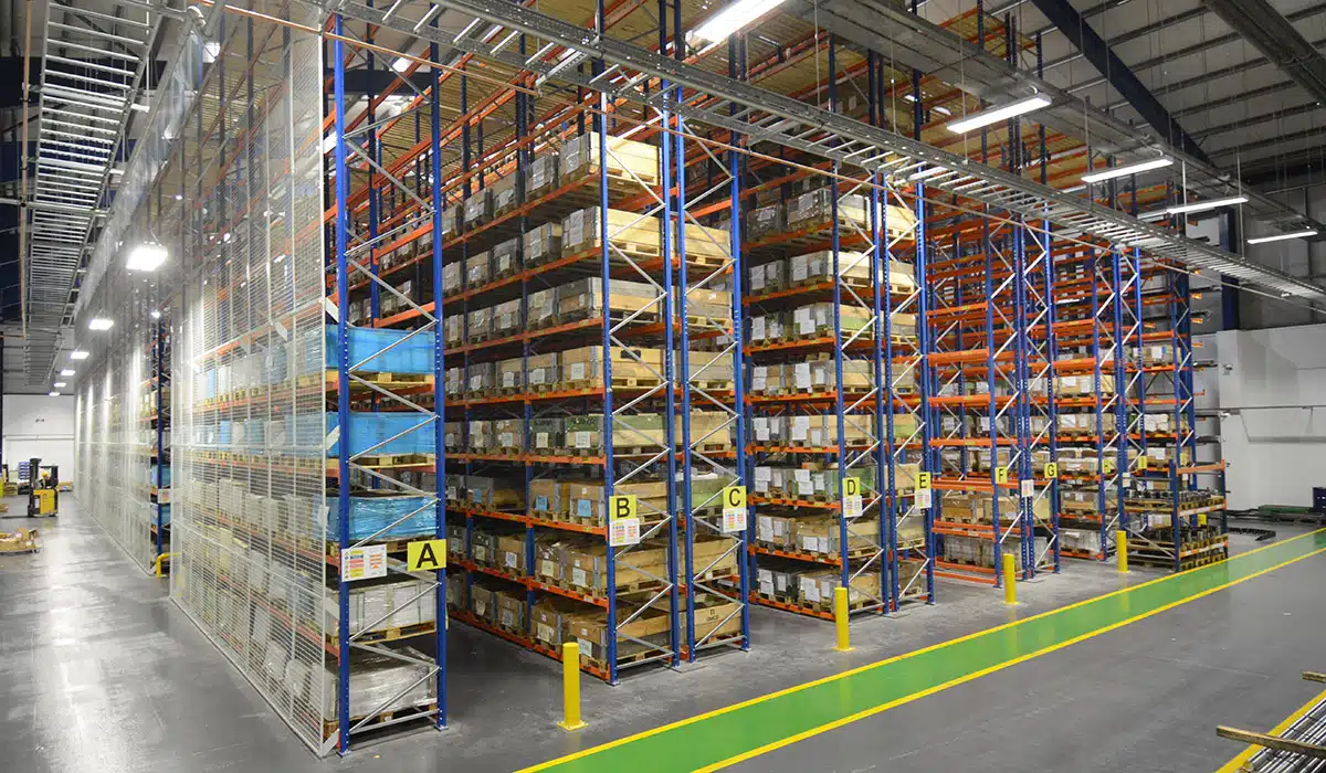 Narrow-aisle racking in multiple sections in a warehouse