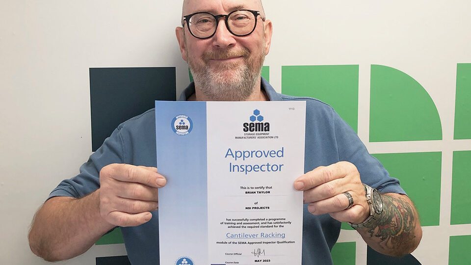 Brian Taylor holding sema approved inspector certificate